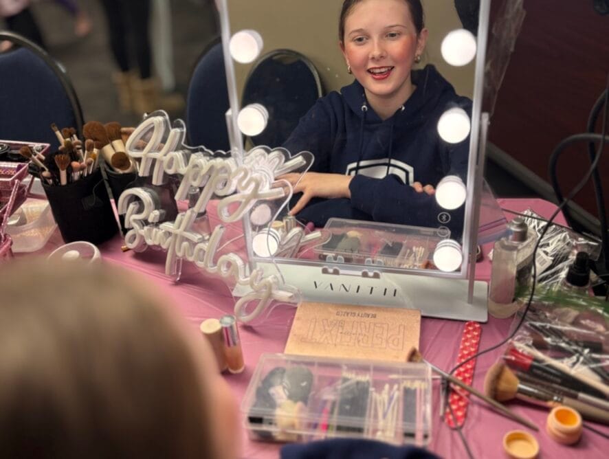 GIRL GETTING MAKEUP DONE AND NAILS AT KIDS SPA IN WINNIPEG THE BEAUTY BOX BY SHERIFF X GLAM GO ROUND