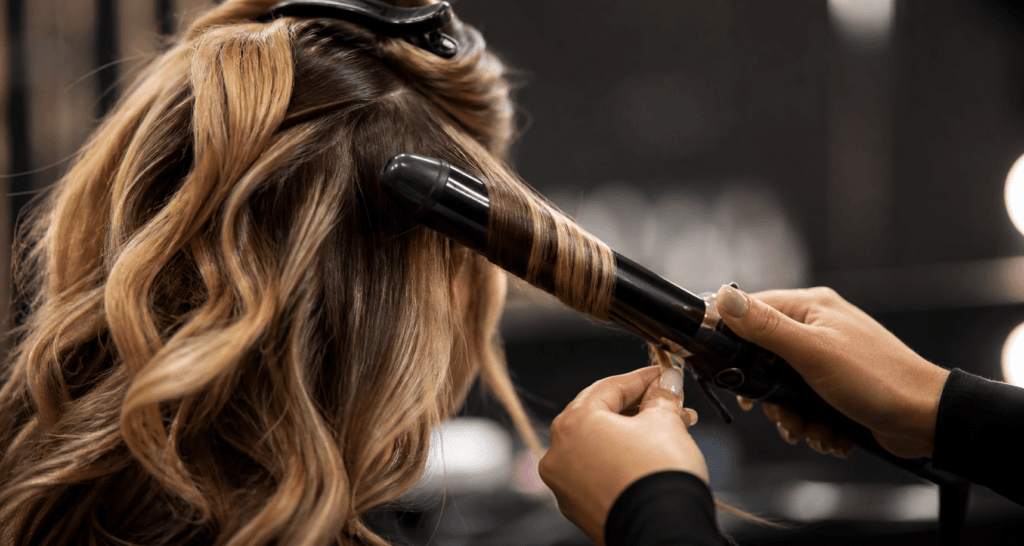 hair styling close up professional hairstylist curling hair freelance beauty jobs Canada hairstylist opportunities