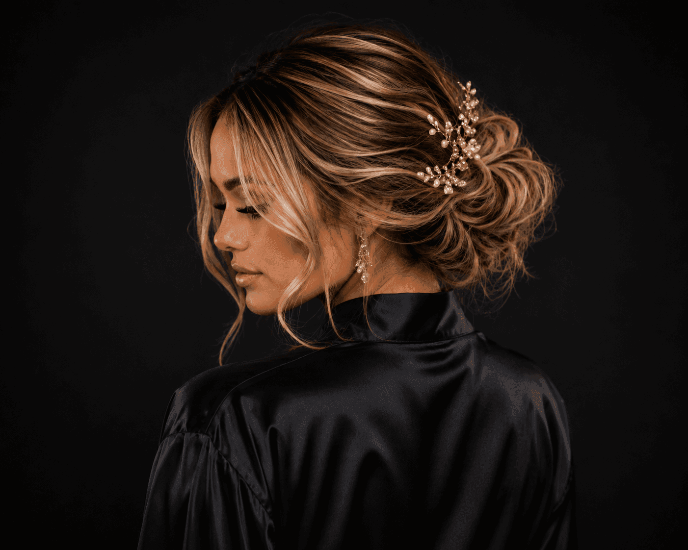 Luxury bridal hair updo in Winnipeg featuring textured blonde bridal hairstyling, glam bridal hair, wedding hairstylist services, and elegant event hair by The Beauty Box by Sheriff x GlamGoRound